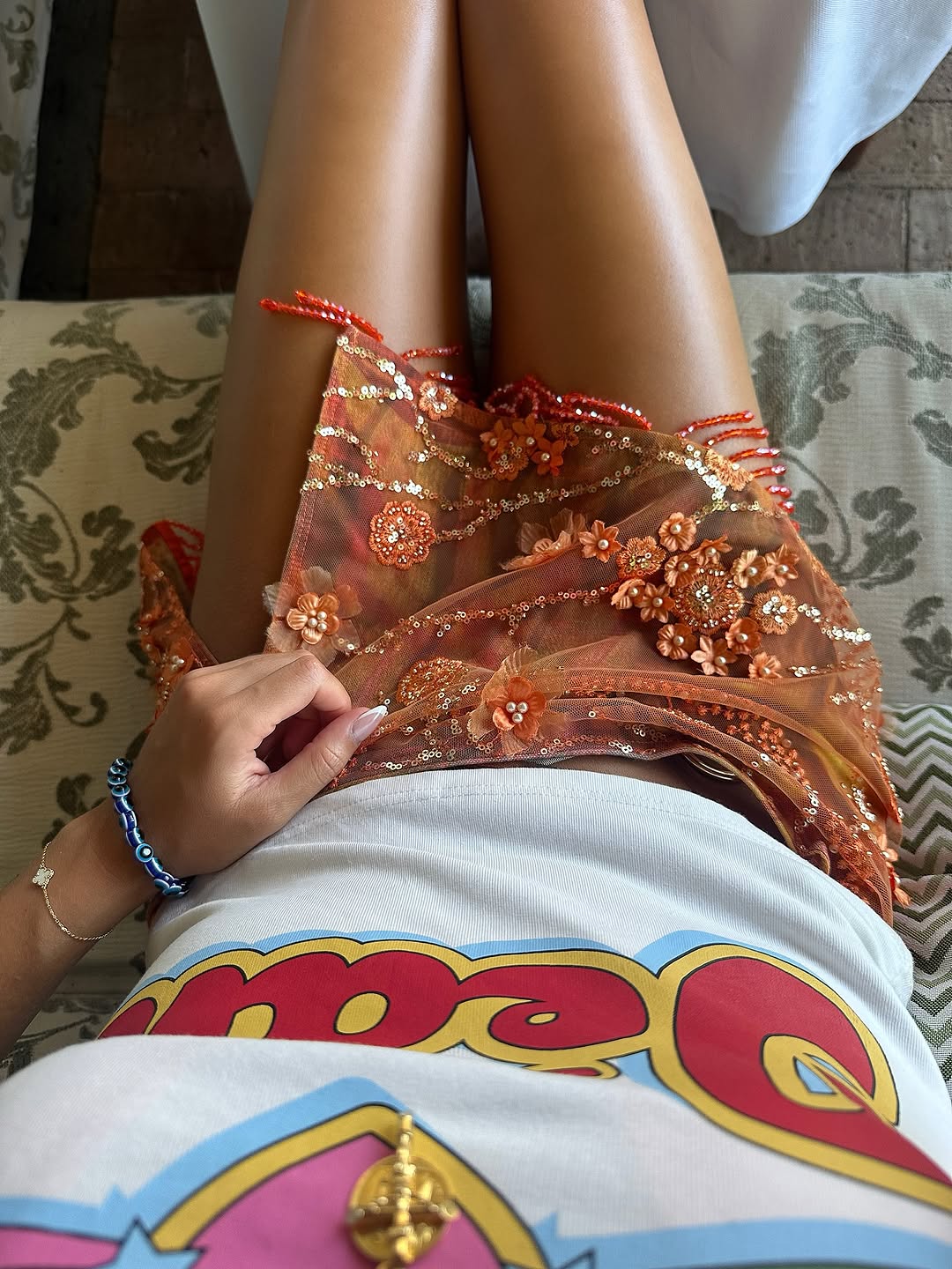 Embellished orange wrap skirt